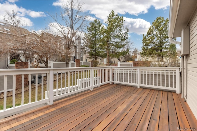 wooden deck featuring a residential view