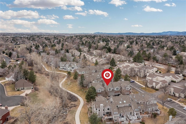 bird's eye view featuring a residential view and a mountain view
