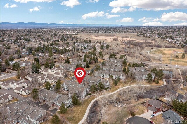 birds eye view of property featuring a residential view and a mountain view