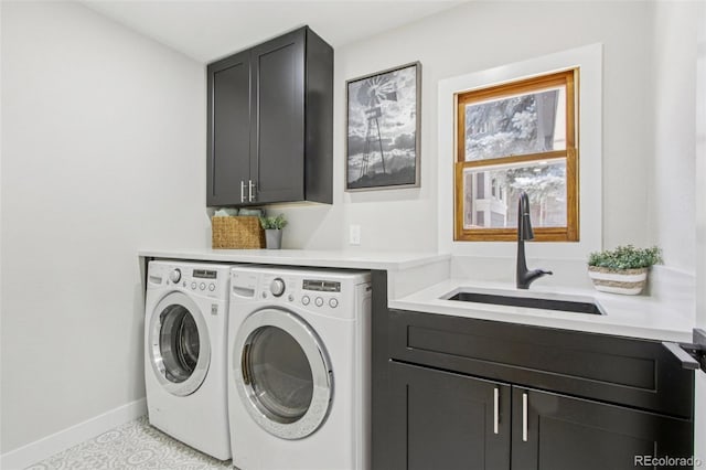 9810 Venneford Ranch Rd, Highlands Ranch, CO 80126 - washroom with cabinet space and separate washer and dryer