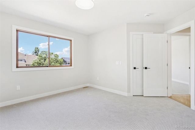 9810 Venneford Ranch Rd, Highlands Ranch, CO 80126 - unfurnished bedroom featuring light carpet