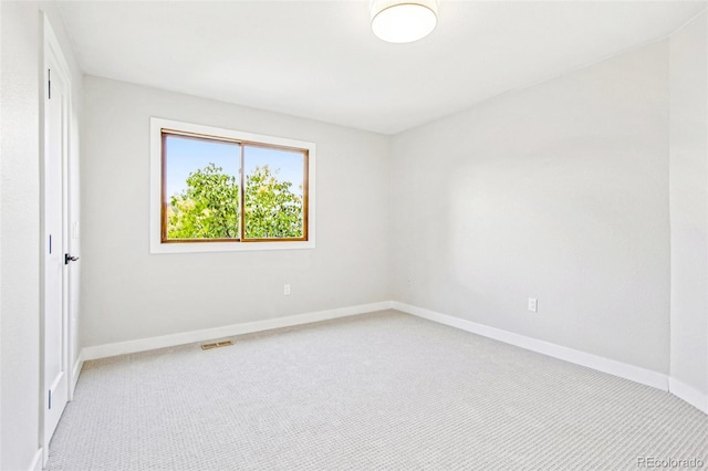 9810 Venneford Ranch Rd, Highlands Ranch, CO 80126 - spare room with light colored carpet and baseboards