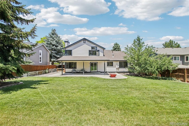 9810 Venneford Ranch Rd, Highlands Ranch, CO 80126 - rear view of house featuring a patio area and a fenced backyard