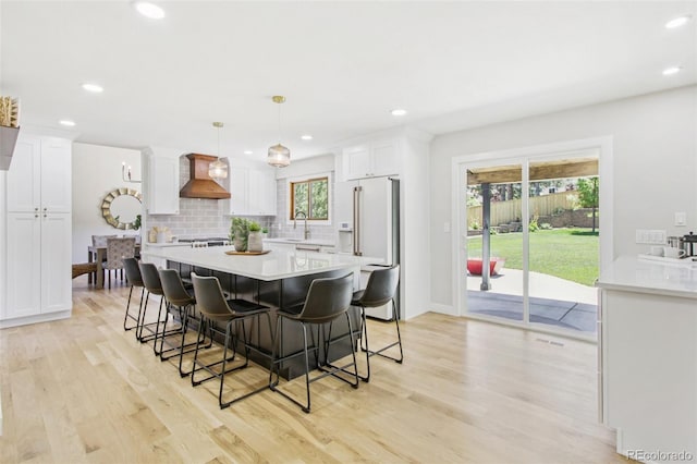 9810 Venneford Ranch Rd, Highlands Ranch, CO 80126 - dining room with light wood-type flooring and recessed lighting