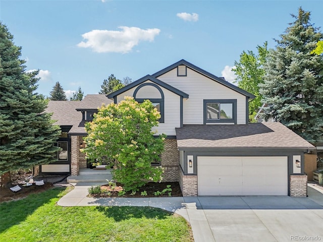9810 Venneford Ranch Rd, Highlands Ranch, CO 80126 - view of front of property featuring brick siding, driveway, roof with shingles, a front yard, and a garage