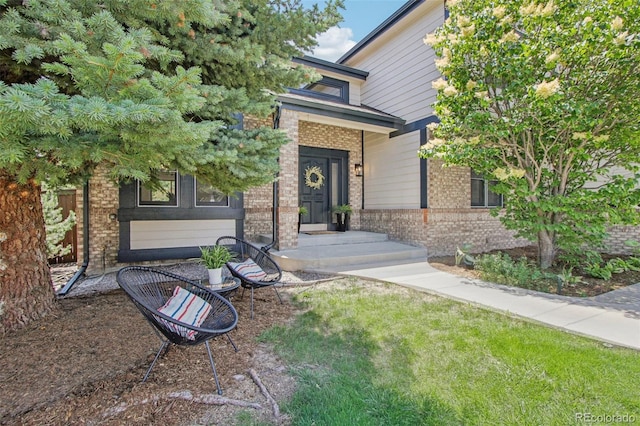 9810 Venneford Ranch Rd, Highlands Ranch, CO 80126 - doorway to property with brick siding