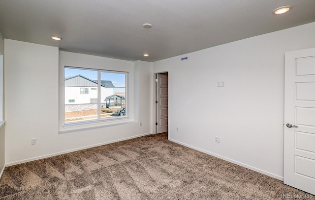 21242 E 63rd Dr, Aurora, CO 80019 - carpeted empty room featuring baseboards and recessed lighting