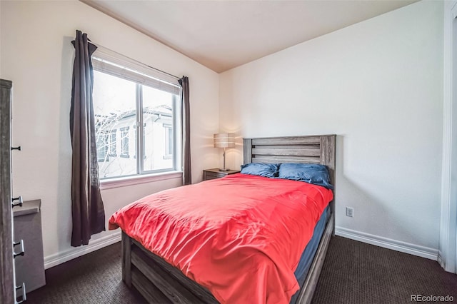 bedroom featuring baseboards