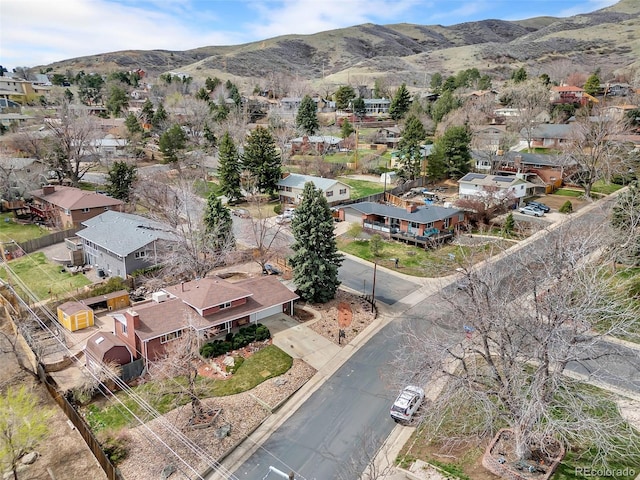drone / aerial view featuring a mountain view and a residential view