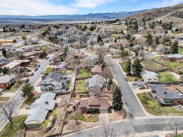 birds eye view of property featuring a residential view and a mountain view