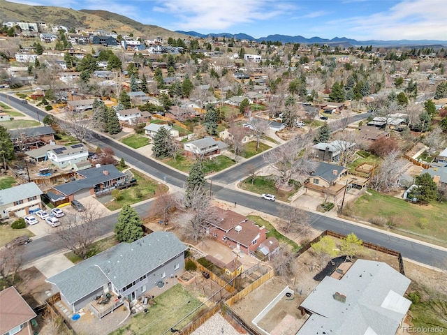 drone / aerial view featuring a mountain view and a residential view