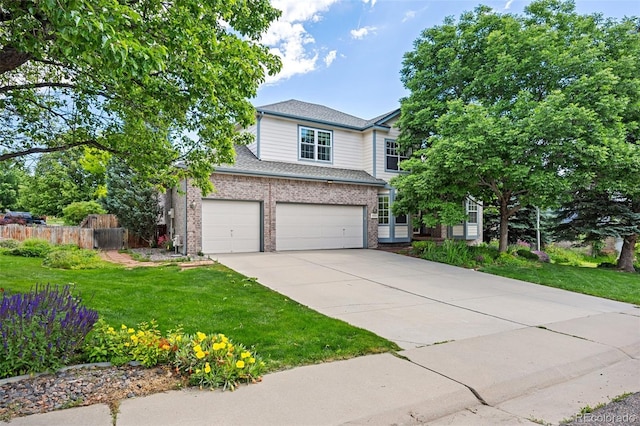 6506 S Robb Way, Littleton, CO 80127 - traditional-style home featuring concrete driveway, brick siding, a shingled roof, and a garage