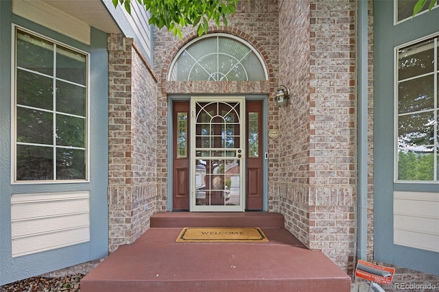 6506 S Robb Way, Littleton, CO 80127 - entrance to property with brick siding