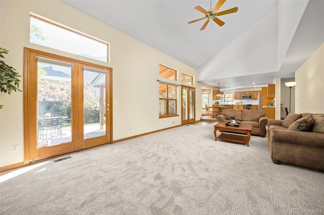 6506 S Robb Way, Littleton, CO 80127 - living room with high vaulted ceiling, carpet, and a ceiling fan