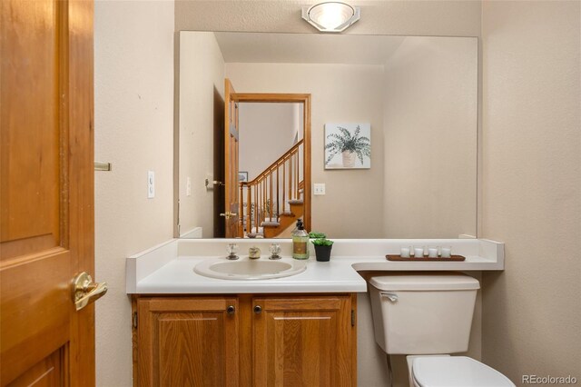 6506 S Robb Way, Littleton, CO 80127 - bathroom with toilet and vanity
