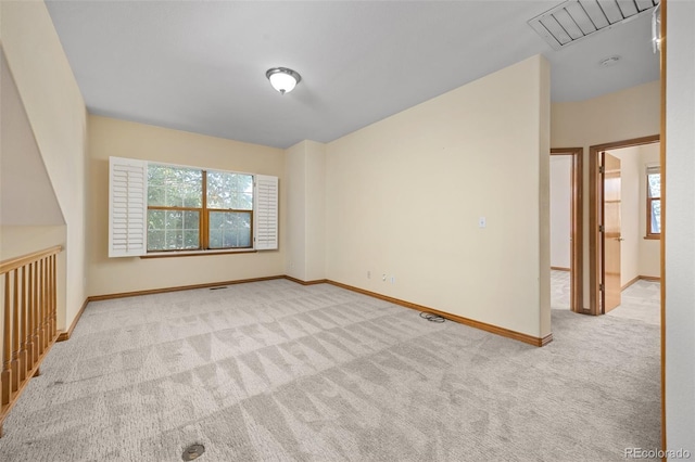 6506 S Robb Way, Littleton, CO 80127 - carpeted spare room featuring baseboards