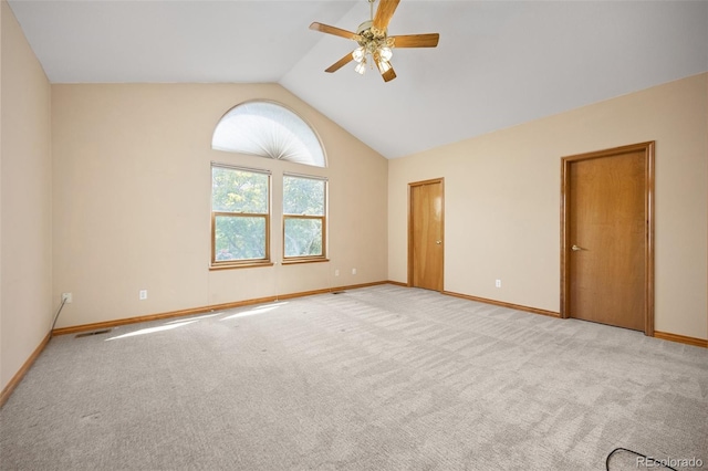 6506 S Robb Way, Littleton, CO 80127 - spare room featuring a ceiling fan, lofted ceiling, and light colored carpet