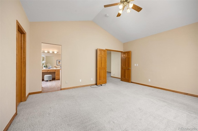 6506 S Robb Way, Littleton, CO 80127 - unfurnished bedroom with light colored carpet, ensuite bathroom, ceiling fan, and high vaulted ceiling