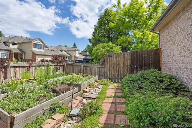 6506 S Robb Way, Littleton, CO 80127 - view of yard with a residential view and a garden