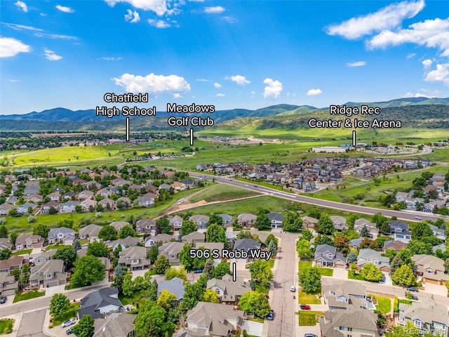 6506 S Robb Way, Littleton, CO 80127 - aerial perspective of suburban area featuring mountains