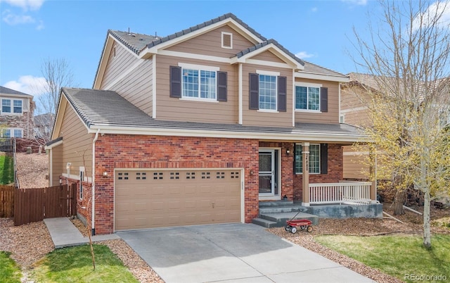 24880 E Euclid Pl, Aurora, CO 80016 - craftsman inspired home featuring concrete driveway, covered porch, brick siding, a garage, and fence