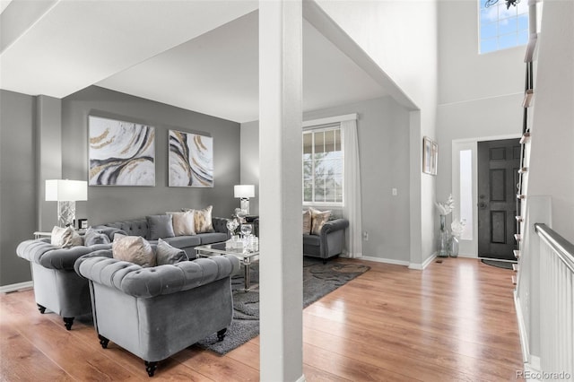 24880 E Euclid Pl, Aurora, CO 80016 - living area featuring light wood-style floors and baseboards