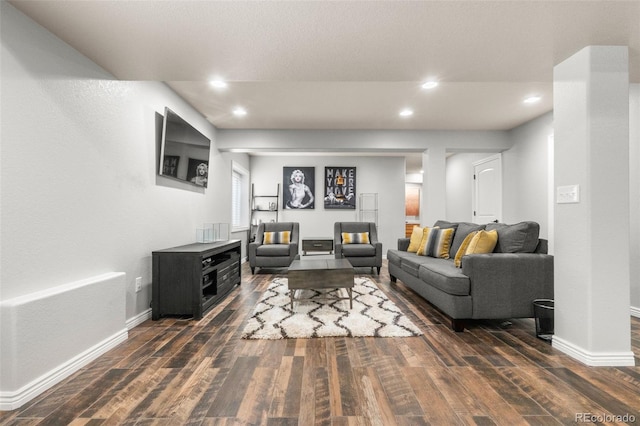24880 E Euclid Pl, Aurora, CO 80016 - living area featuring baseboards, dark wood-style flooring, and recessed lighting