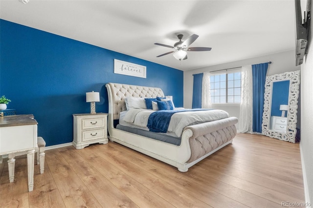 24880 E Euclid Pl, Aurora, CO 80016 - bedroom with light wood finished floors, a ceiling fan, and baseboards