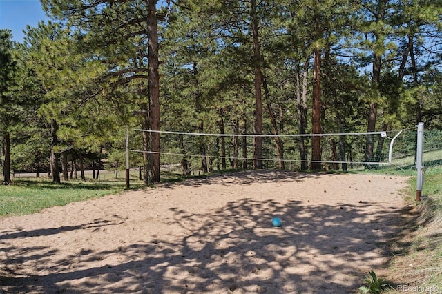 view of property's community featuring volleyball court