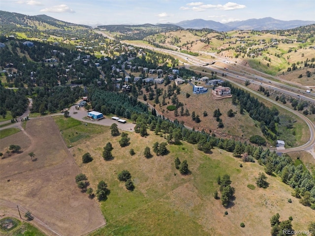 bird's eye view with a mountain view