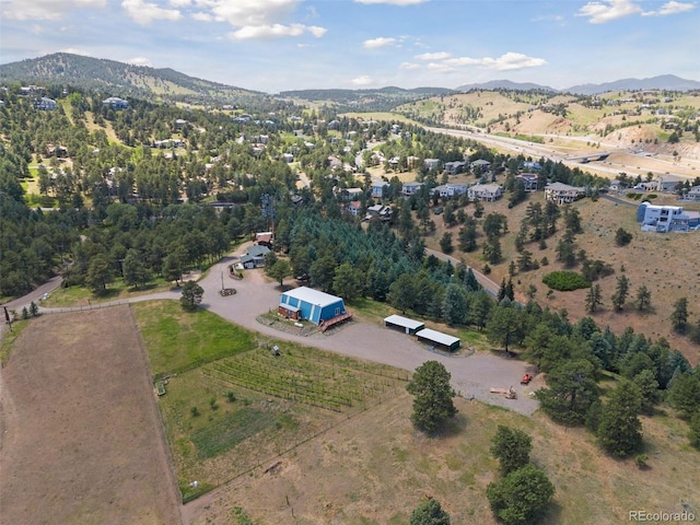 bird's eye view with a mountain view