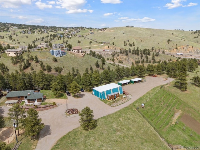 birds eye view of property featuring a rural view