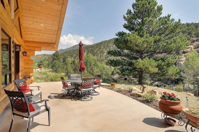 view of patio / terrace with a mountain view