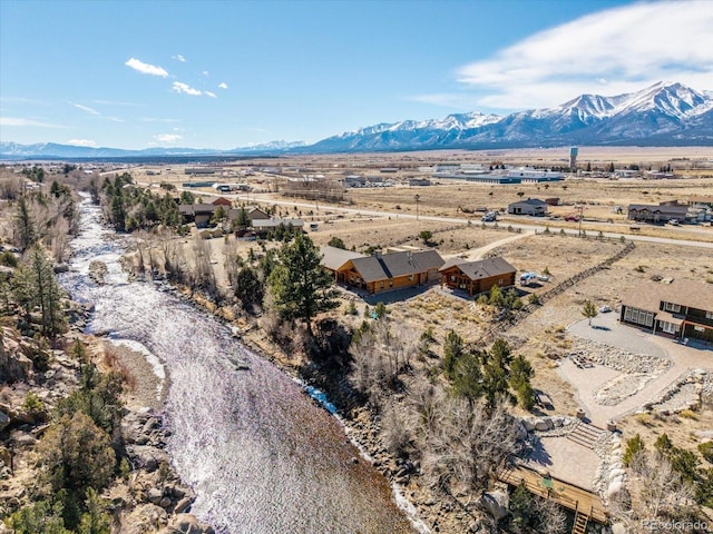 aerial view with a mountain view and a rural view