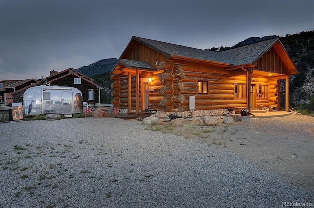 view of front facade with log exterior