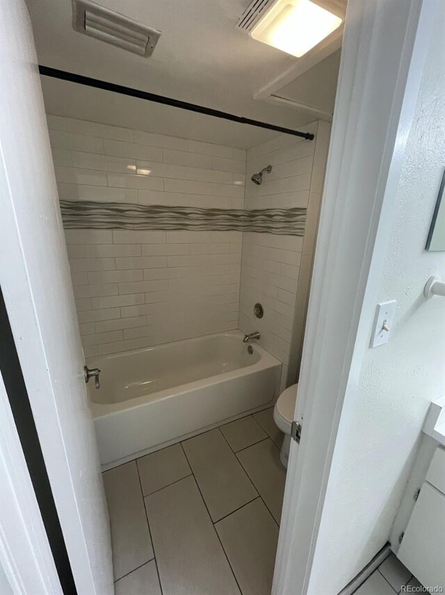 full bath featuring tile patterned flooring, visible vents, toilet, and shower / bath combination