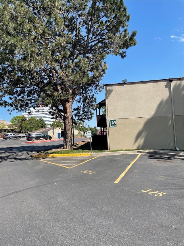 9995 E Harvard Ave Unit 177, Denver, CO 80231 - view of uncovered parking lot