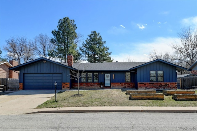 view of front of property featuring a garage, board and batten siding, concrete driveway, and fence