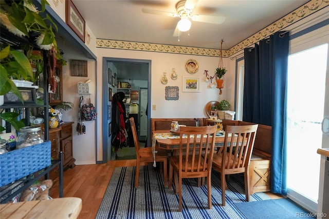 19258 E Kansas Dr, Aurora, CO 80017 - dining area with wood finished floors and a ceiling fan