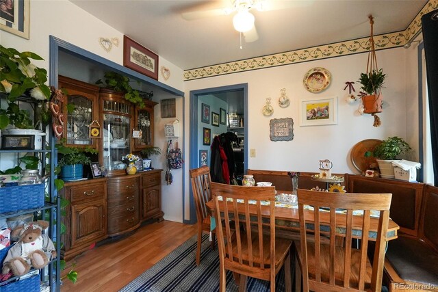 19258 E Kansas Dr, Aurora, CO 80017 - dining room featuring a ceiling fan and wood finished floors
