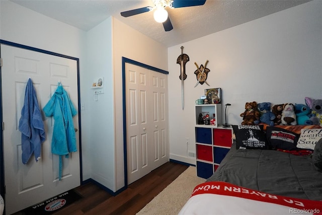 19258 E Kansas Dr, Aurora, CO 80017 - bedroom featuring wood finished floors, a closet, and ceiling fan