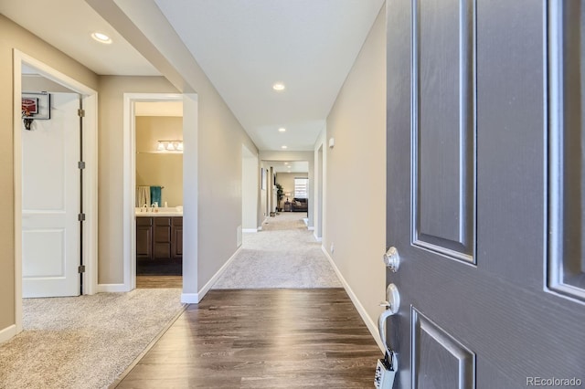 corridor featuring hardwood / wood-style floors