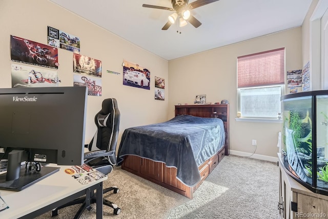 bedroom featuring light carpet and ceiling fan