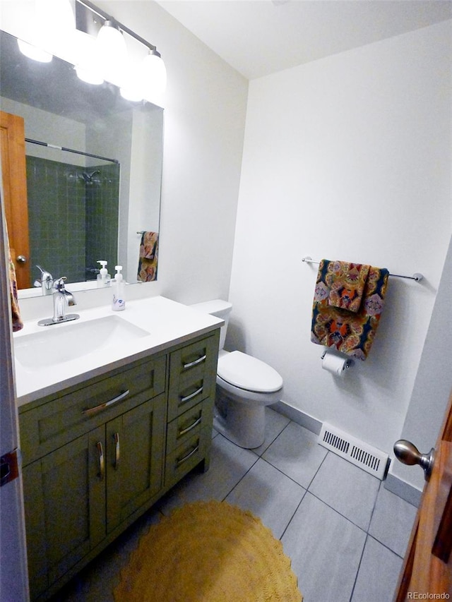 bathroom with toilet, a shower, vanity, visible vents, and tile patterned floors