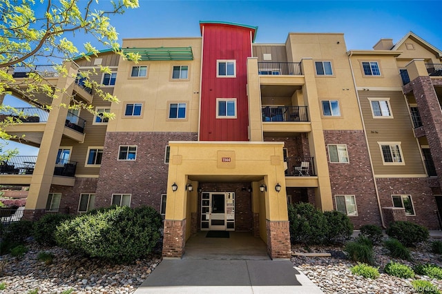 1144 Rockhurst Dr Unit 105, Highlands Ranch, CO 80129 - view of apartment building / complex