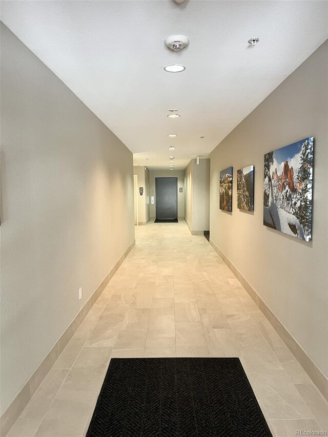 1144 Rockhurst Dr Unit 105, Highlands Ranch, CO 80129 - hallway with baseboards