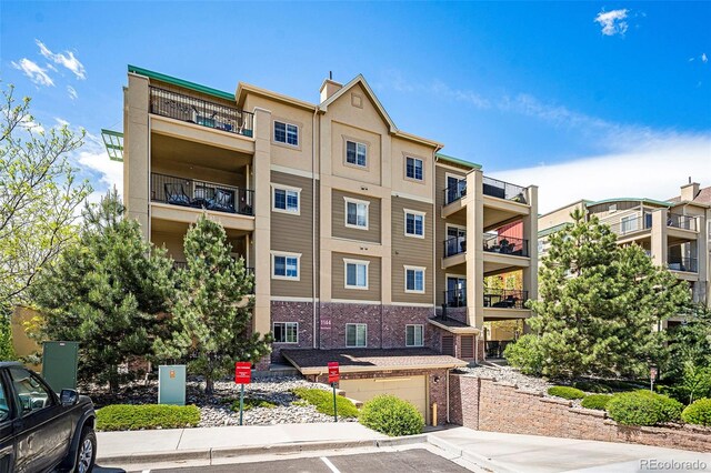 1144 Rockhurst Dr Unit 105, Highlands Ranch, CO 80129 - view of apartment building / complex