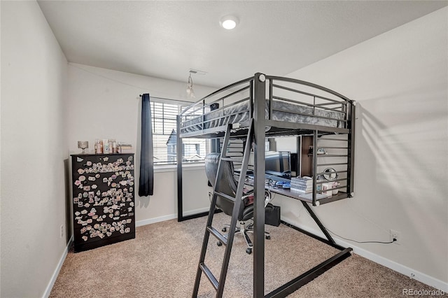 bedroom featuring carpet