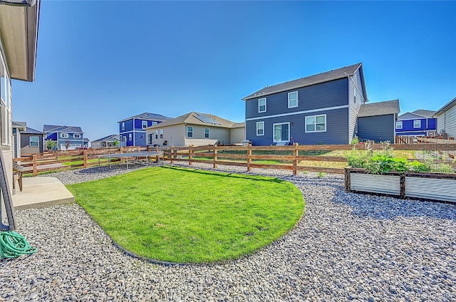 view of yard featuring a trampoline