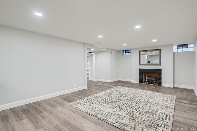 basement featuring hardwood / wood-style floors